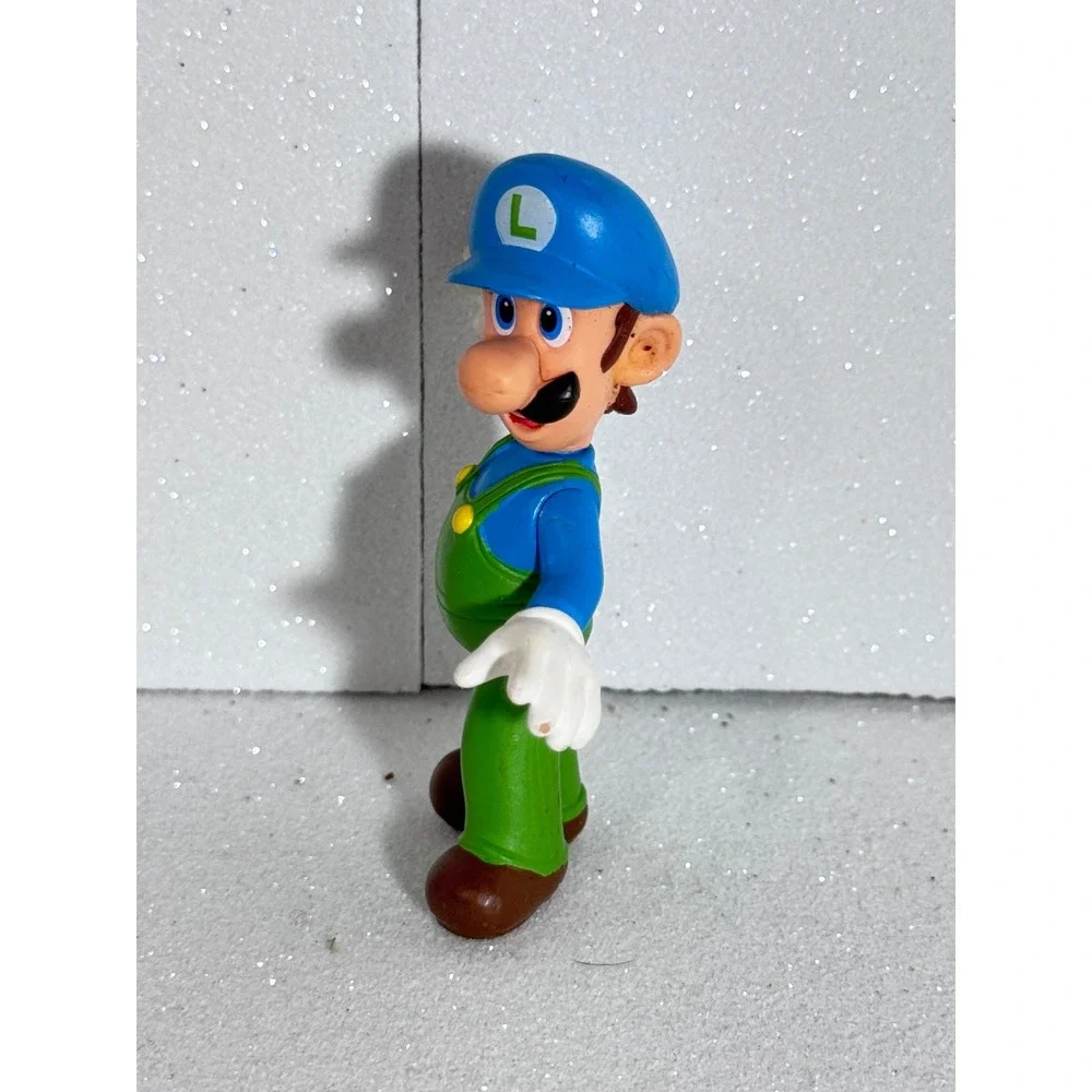 Jakks Pacific World of Nintendo Luigi Blue and Green Action Figure 2.5 inch